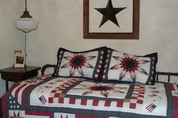 Second bedroom has 2 twin beds covered with handcrafted quilts